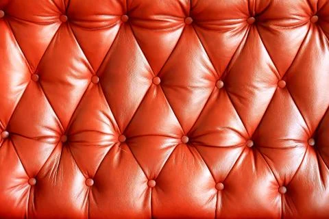 Background image of plush red leather from an antique seat Stock Photos