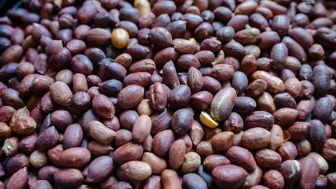 Background image of roasted peanuts with skin, Stock-Fotos