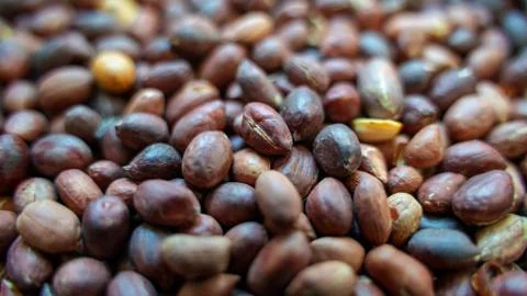 Background image of roasted peanuts with skin, Stock Photos