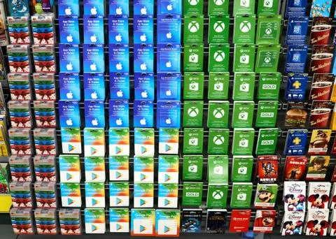 A background image of a stand with gift cards of Apple Store, McDonalds, Xbox 写真素材