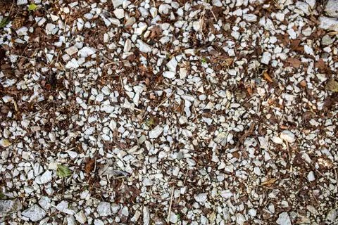 Background image of a stone crumb with small and large stones Stock Photos