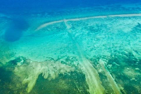 Background image of the turquoise sea. Deep sea and corals. Stock Photos