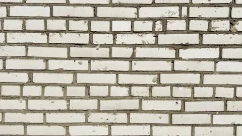 Background image of white painted brick wall with raw mortar joints Stock Footage 330360702