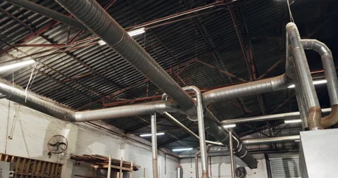 Background, industry and pipes in empty warehouse for manufacturing, production Stock Footage 340609813