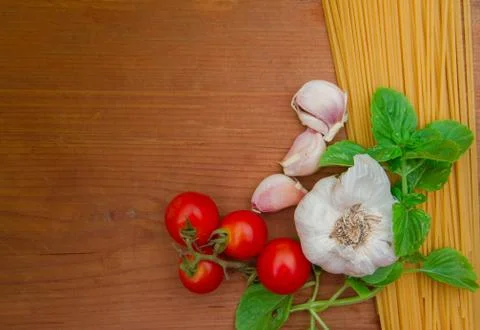 Background ingredients kitchen top view with noodles eggs tomatoes and fresh  Stock Photos