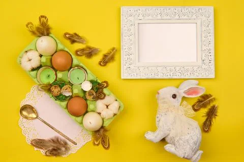 Background to insert in a vintage frame with feathers and Easter decor Stock Photos
