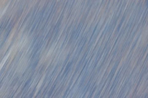 Background of intentional blurring creating a blue themed diagonal pattern Stock Photos