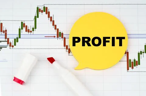 On the background of interactive forex charts there is a marker and a sticker Stock-Fotos