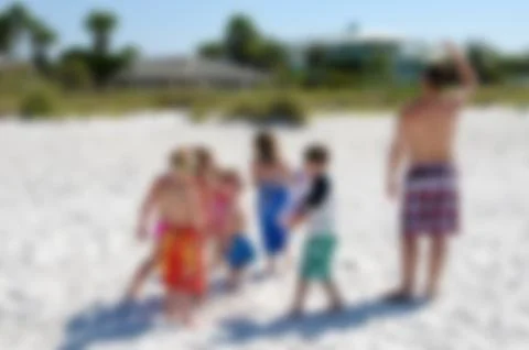 Background of Kids on the Beach Stock Photos