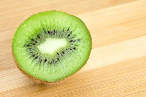 Background kiwi slice closeup Stock Photos