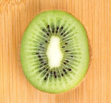 Background kiwi slice closeup Stock Photos