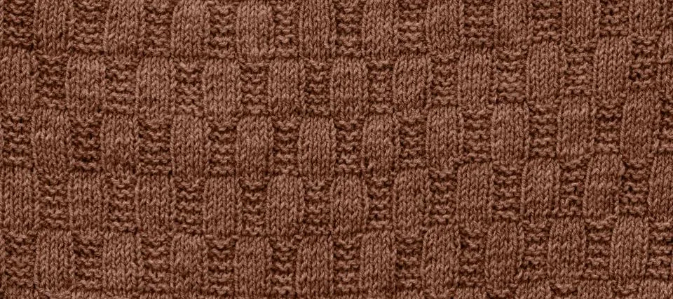Background of knitting pattern. Mocha Mousse, Color of the Year 2025. Stock Photos