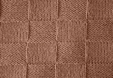 Background of knitting pattern. Mocha Mousse, Color of the Year 2025. 스톡 사진