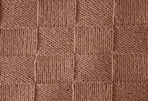 Background of knitting pattern. Mocha Mousse, Color of the Year 2025. 스톡 사진