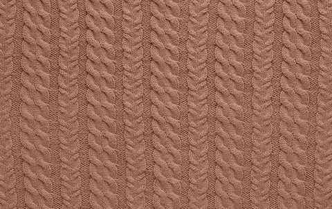 Background of knitting pattern. Mocha Mousse, Color of the Year 2025. 스톡 사진