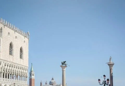 Background with landmarks elements of St. Mark's Square and blue sky with cop Stock Photos