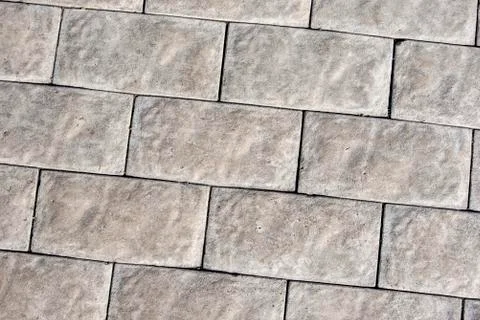 The background of the large stone bricks of grey color Stock Photos