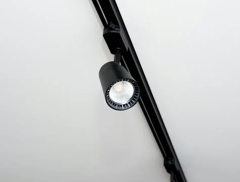 Background Led track lamp on the ceiling in the interior. Interior spotligh.. Stock Photos