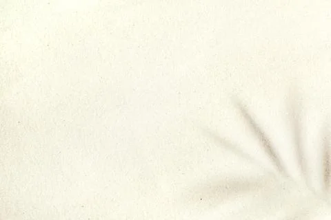 Background of light beach sand with space for text. Stock Photos
