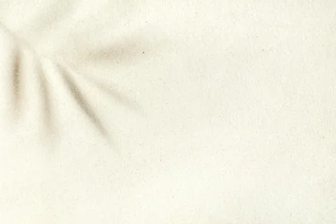 Background of light beach sand with space for text. Stock Photos