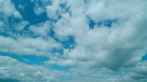 Background Of Light Calm Clouds Changes Shape. Clouds Running Across Blue Sky Stock Footage 262765994