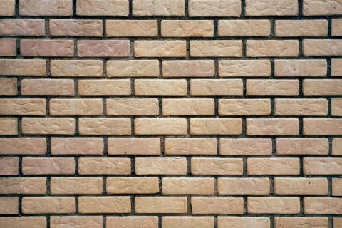 Background of light decorative brick wall texture Stock Photos