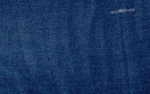 Background in light denim fabric Stock Photos