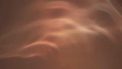 Background of light flares on a white wall in red and yellow. Light movement. Stock Footage 157183393