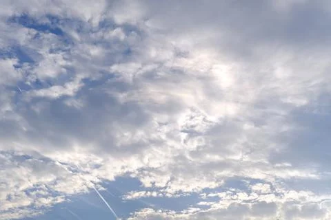 Background light sky gradient, close-up of beautiful white fluffy clouds in b Stock Photos