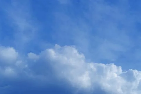 Background light sky gradient, close-up of beautiful white fluffy clouds in.. Stock Photos