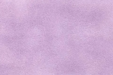 Background of light violet suede fabric closeup. Velvet matt texture of lilac Stock Photos
