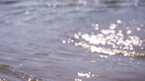Background of lights sparkling in defocused lake surface. Full HD RAW video. Stock Footage 58669352