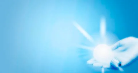 Background with lit lightbulb Stock Illustration