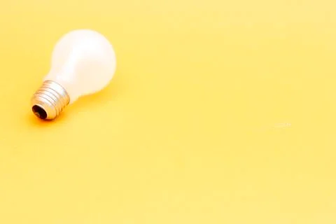 Background with lit lightbulb Stock Photos