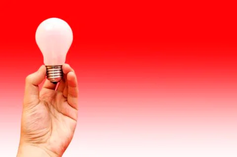 Background with lit lightbulb Stock Photos