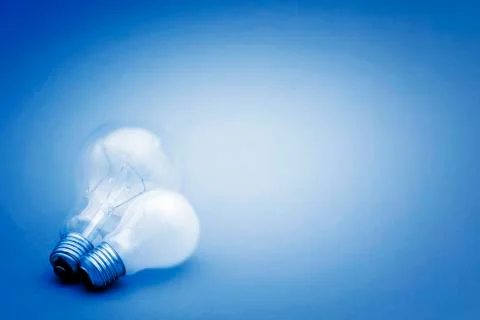 Background with lit lightbulb Stock Photos