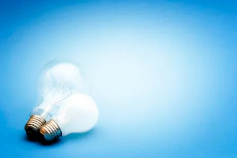 Background with lit lightbulb Stock Photos