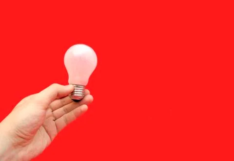 Background with lit lightbulb Stock Photos