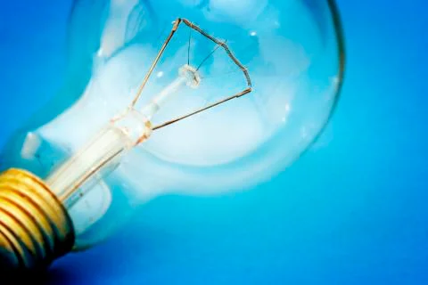 Background with lit lightbulb Stock Photos