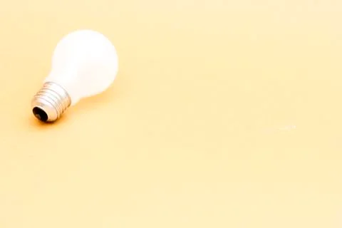 Background with lit lightbulb Stock Photos