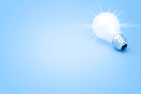 Background with lit lightbulb Stock Photos