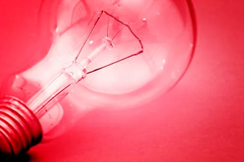 Background with lit lightbulb Stock Photos