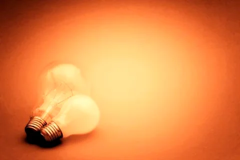 Background with lit lightbulb Foto stock