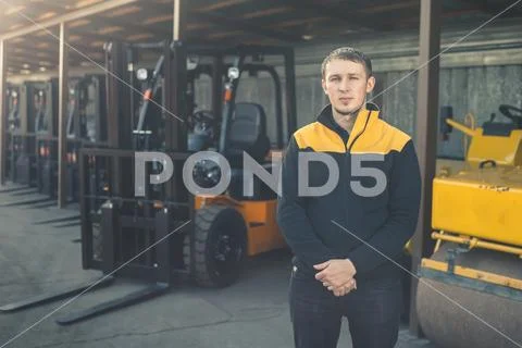 Background of a lot of forklifts, reliable heavy loader, truck Stock Photos