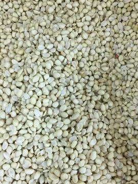 Background with lots of peeled peanuts Stock Photos