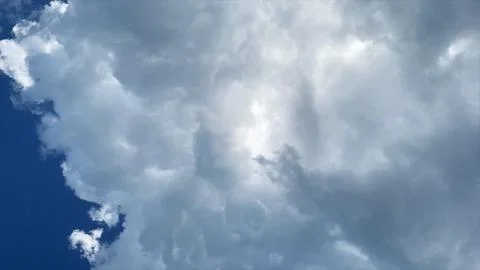 Background of lush clouds and blue sky Stock Photos