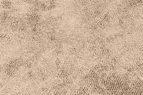 Background made of beige microfiber fabric Stock Photos