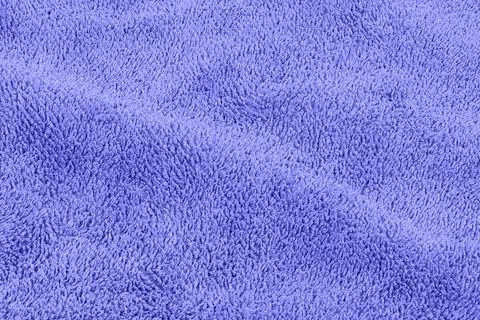 Background made of blue microfiber fabric Stock Photos