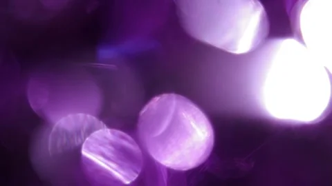 Background made of a bright purple bokeh light effect Stock Footage 318945574