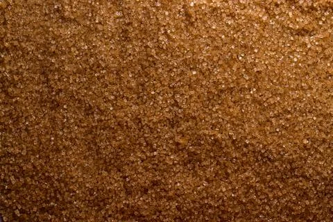 The background is made of brown sugar. background from food Stock Photos